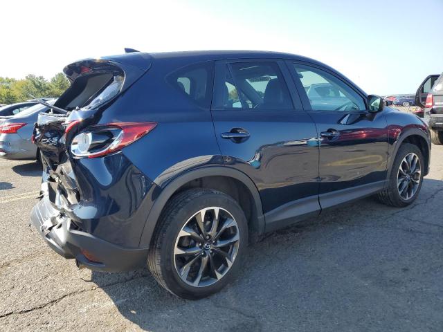 Photo 3 from auction – 2016 MAZDA CX-5 GT with VIN JM3KE4DYXG0656838