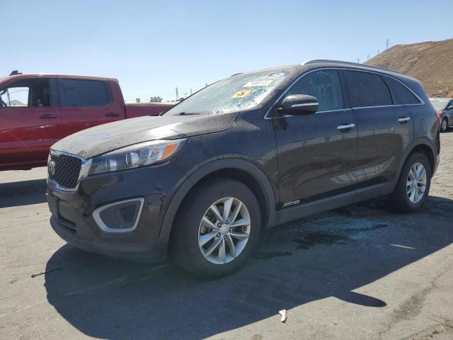 KIA SORENTO LX 2016 with VIN 5XYPGDA58GG131693 - Photo from auction
