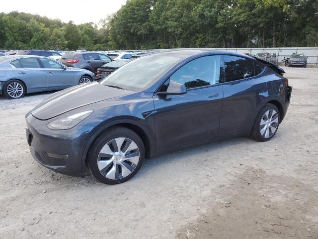 TESLA MODEL Y 2024 with VIN 7SAYGAEE4RF086536 - Photo from auction