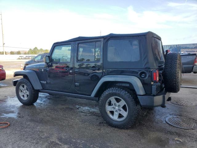 Photo 2 from auction – 2012 JEEP WRANGLER U with VIN 1C4HJWFG7CL125572