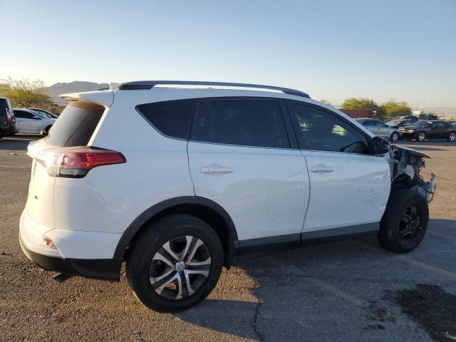 Photo 3 from auction – 2018 TOYOTA RAV4 LE with VIN 2T3ZFREV9JW491258