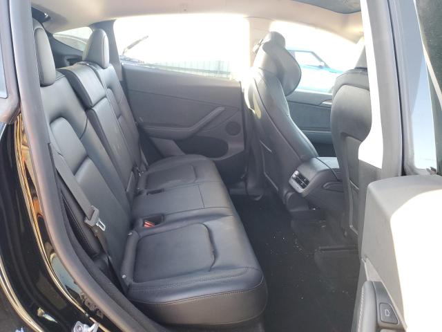 Photo 10 from auction – 2023 TESLA MODEL Y with VIN 7SAYGDEE1PF827580
