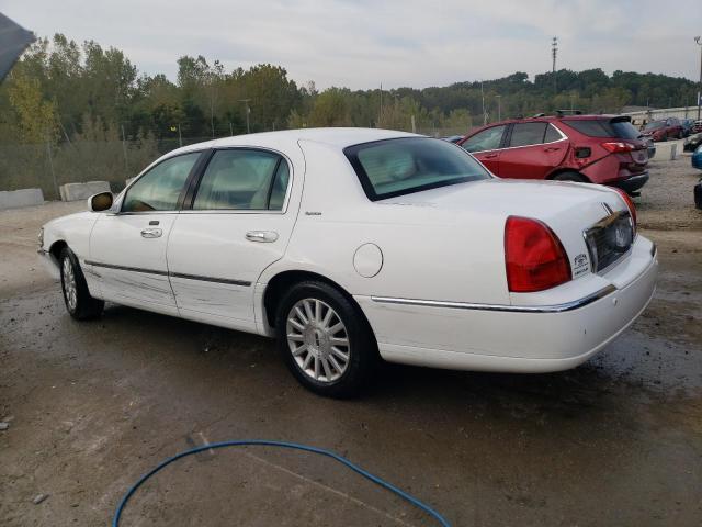 Photo 2 from auction – 2004 LINCOLN TOWN CAR E with VIN 1LNHM81W04Y681871