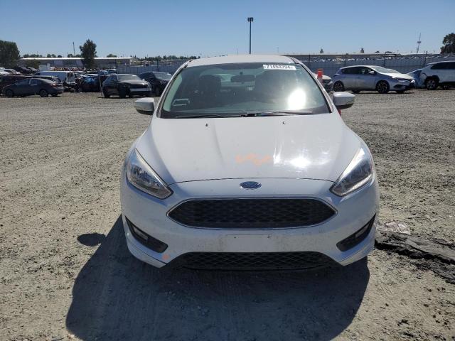 Photo 5 from auction – 2015 FORD FOCUS SE with VIN 1FADP3F2XFL380212