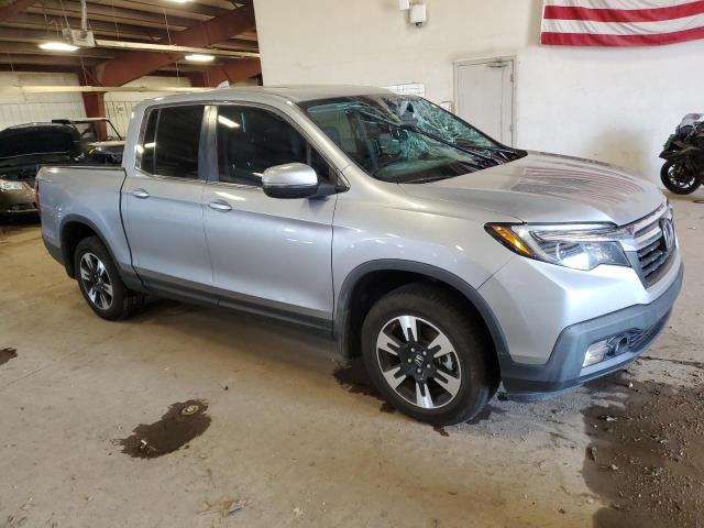 Photo 4 from auction – 2020 HONDA RIDGELINE with VIN 5FPYK3F57LB015853