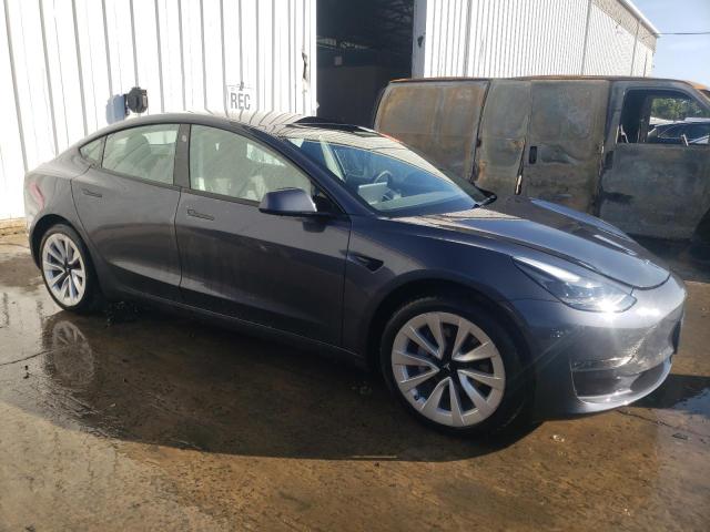 Photo 4 from auction – 2022 TESLA MODEL 3 with VIN 5YJ3E1EA9NF130342