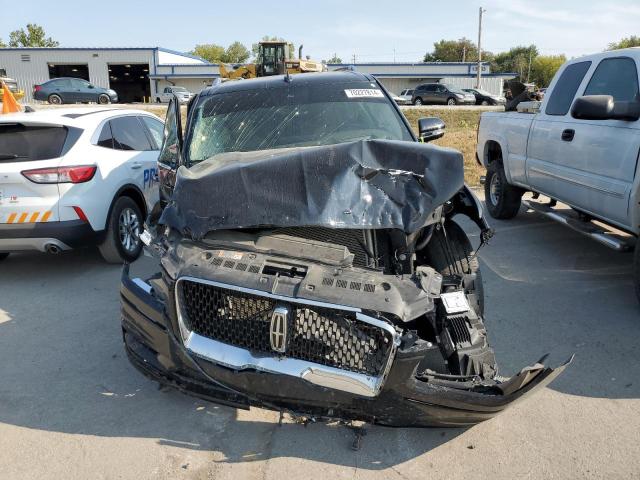 Photo 5 from auction – 2021 LINCOLN NAVIGATOR with VIN 5LMJJ2LTXMEL04425