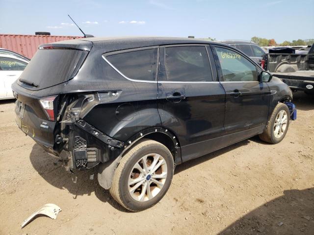 Photo 3 from auction – 2017 FORD ESCAPE SE with VIN 1FMCU9GD7HUC04342