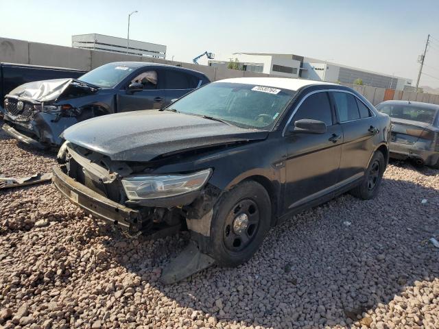 FORD TAURUS POL 2014 with VIN 1FAHP2MK0EG129804 - Photo from auction