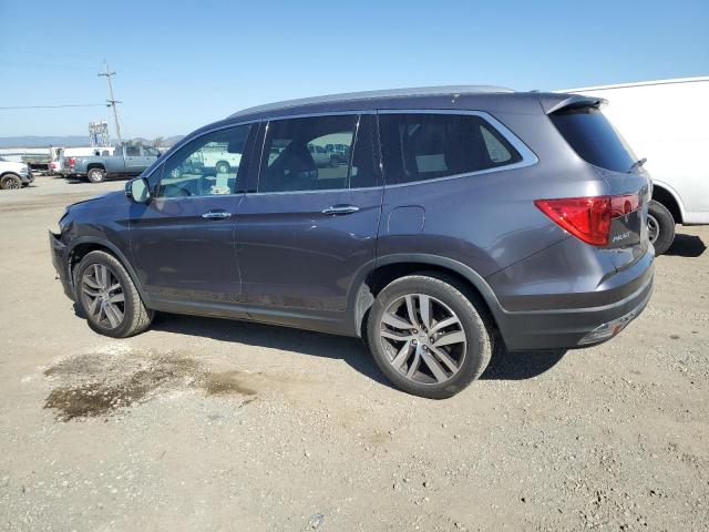 Photo 2 from auction – 2017 HONDA PILOT TOUR with VIN 5FNYF5H96HB025385
