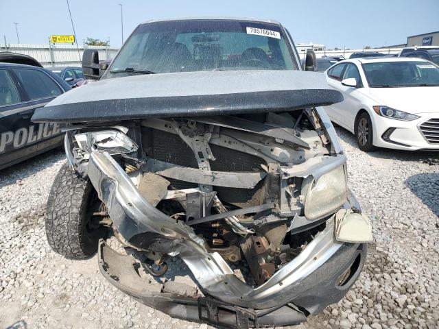 Photo 5 from auction – 1999 FORD F150 with VIN 1FTRX18W7XKB12844