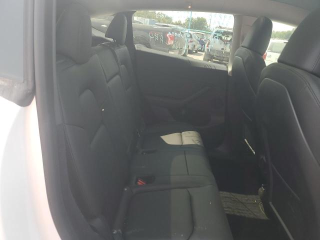 Photo 11 from auction – 2023 TESLA MODEL Y with VIN 7SAYGDEE0PF673590