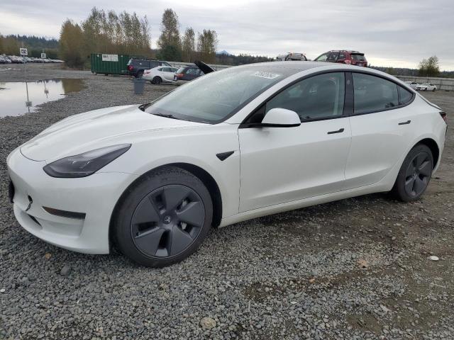 TESLA MODEL 3 2023 with VIN 5YJ3E1EAXPF568015 - Photo from auction