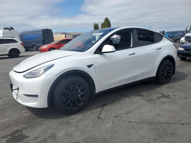 TESLA MODEL Y 2020 with VIN 5YJYGDEE9LF011238 - Photo from auction