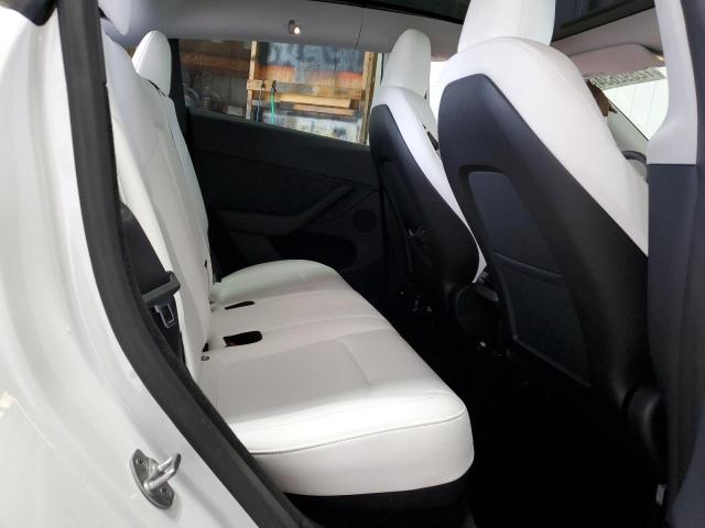 Photo 11 from auction – 2023 TESLA MODEL Y with VIN 7SAYGDEE9PA164143