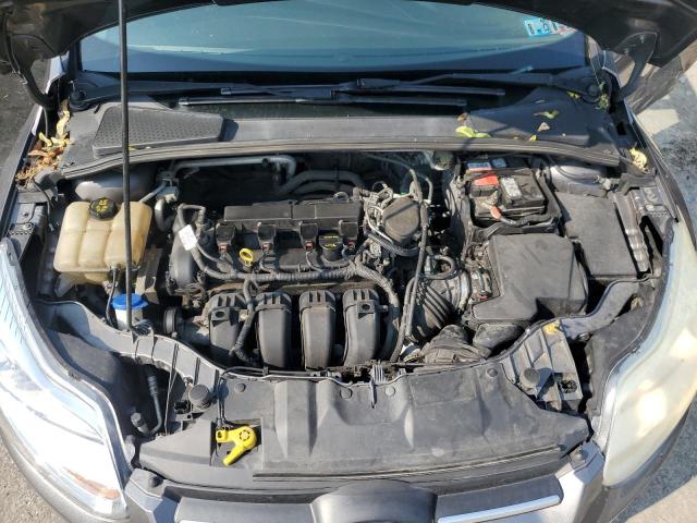 Photo 11 from auction – 2014 FORD FOCUS SE with VIN 1FADP3F21EL240953