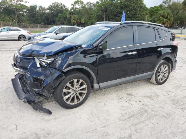 TOYOTA RAV4 LIMIT 2018 with VIN 2T3YFREV4JW415281 - Photo from auction