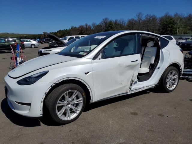 TESLA MODEL Y 2022 with VIN 7SAYGDEE7NF325895 - Photo from auction