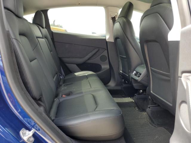 Photo 11 from auction – 2023 TESLA MODEL Y with VIN 7SAYGDEE1PA094721