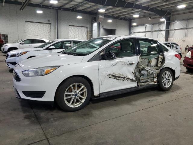 FORD FOCUS SE 2016 with VIN 1FADP3F24GL231585 - Photo from auction