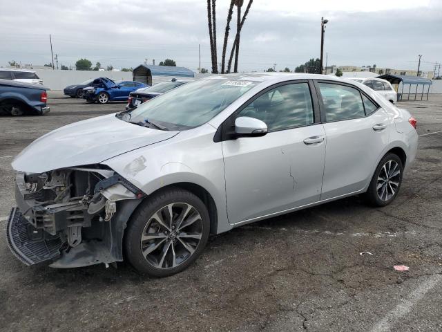 TOYOTA COROLLA L 2018 with VIN 2T1BURHE9JC067902 - Photo from auction