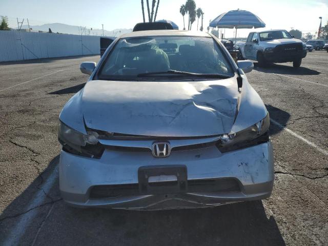 Photo 5 from auction – 2006 HONDA CIVIC HYBR with VIN JHMFA36256S023903
