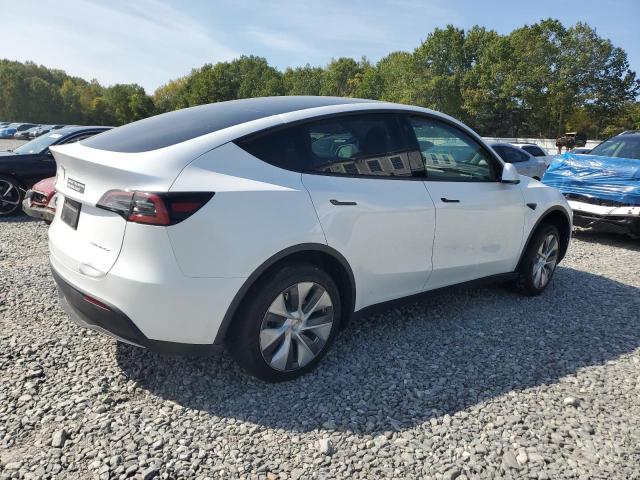 Photo 3 from auction – 2023 TESLA MODEL Y with VIN 7SAYGDEE6PA097596