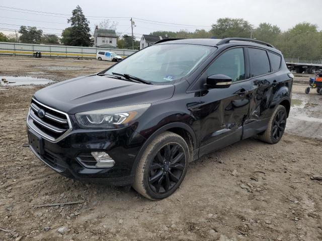 FORD ESCAPE TITANIUM 2017 with VIN 1FMCU9JD7HUD63550 - Photo from auction
