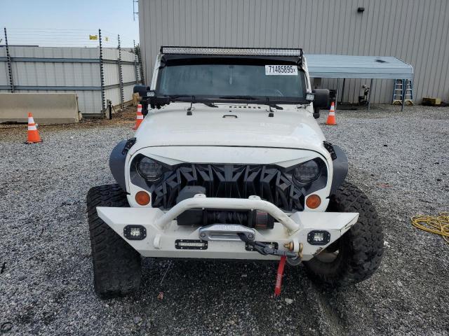 Photo 5 from auction – 2010 JEEP WRANGLER U with VIN 1J4BA5H14AL186457
