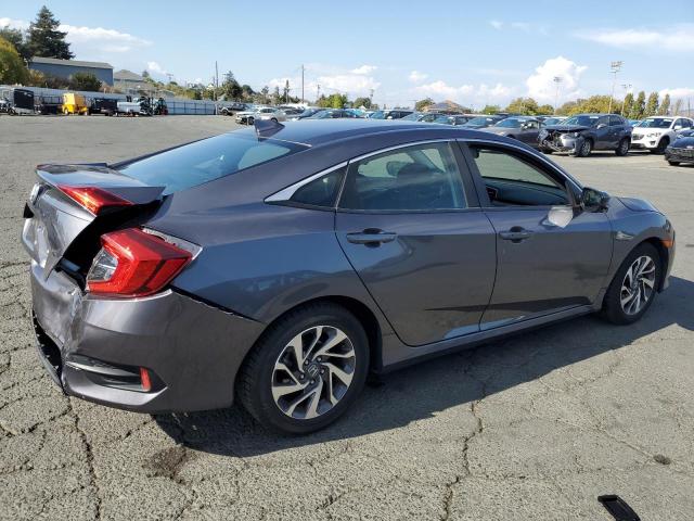 Photo 3 from auction – 2018 HONDA CIVIC EX with VIN 2HGFC2F74JH532657