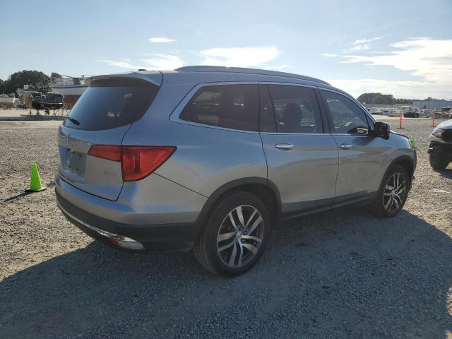 Photo 3 from auction – 2017 HONDA PILOT TOUR with VIN 5FNYF5H98HB027672