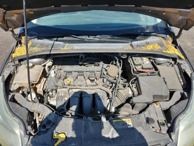 Photo 11 from auction – 2014 FORD FOCUS S with VIN 1FADP3E20EL155443