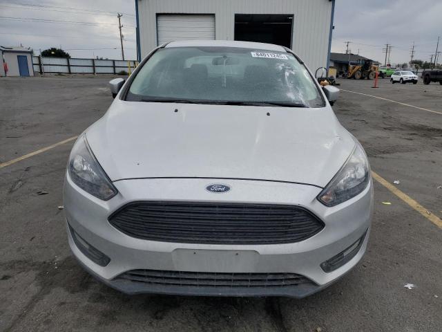 Foto 5 de la subasta – 2018 FORD FOCUS SE con VIN 1FADP3FE5JL278237