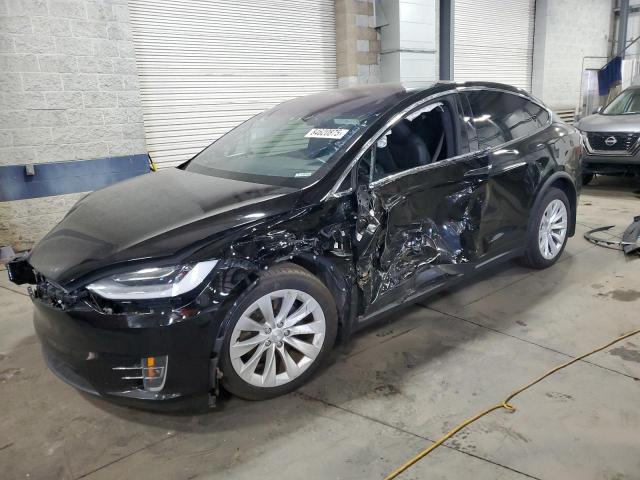 TESLA MODEL X 2020 with VIN 5YJXCBE25LF298417 - Photo from auction