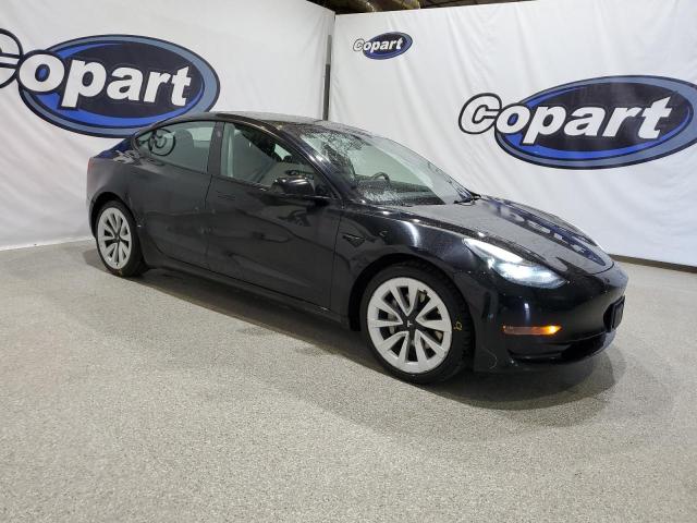 Photo 4 from auction – 2022 TESLA MODEL 3 with VIN 5YJ3E1EA7NF289697
