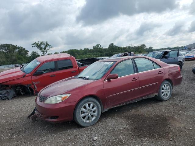 TOYOTA CAMRY LE 2002 with VIN JTDBE32K320024452 - Photo from auction