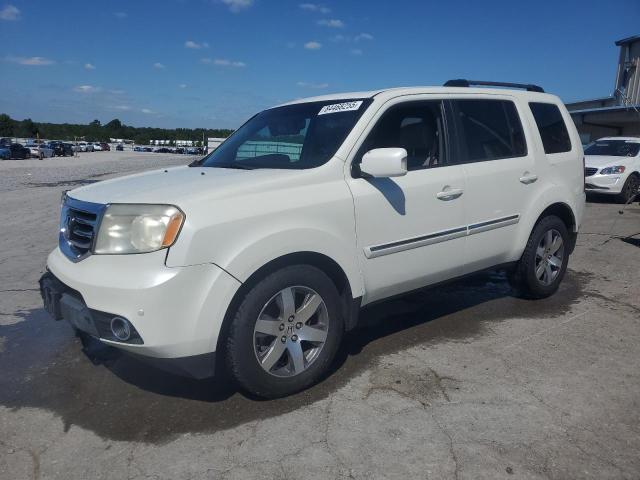 HONDA PILOT TOUR 2014 with VIN 5FNYF3H93EB023545 - Photo from auction