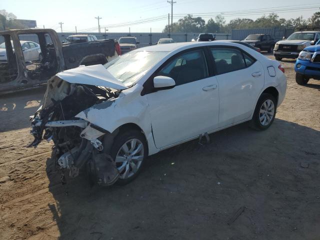 TOYOTA COROLLA L 2016 with VIN 5YFBURHE5GP517599 - Photo from auction