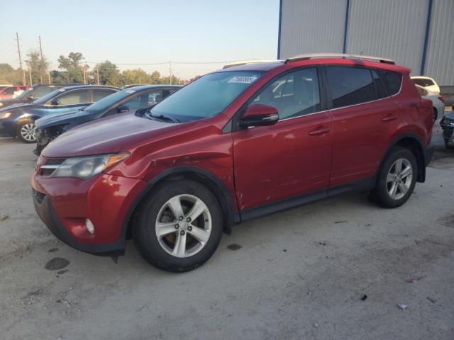 TOYOTA RAV4 XLE 2014 with VIN 2T3RFREV9EW219296 - Photo from auction
