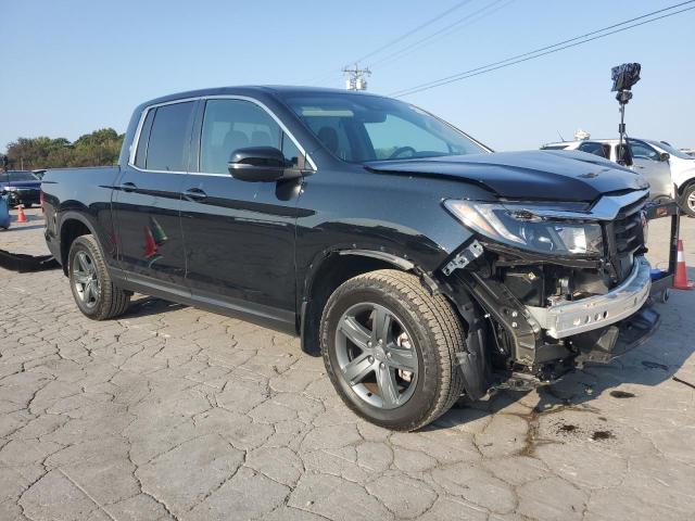 Photo 4 from auction – 2023 HONDA RIDGELINE RTL with VIN 5FPYK3F52PB068840