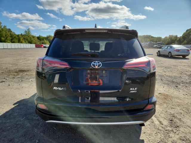 Photo 6 from auction – 2016 TOYOTA RAV4 XLE with VIN 2T3RFREV7GW516098