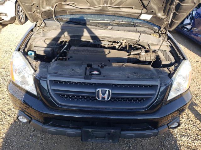 Photo 11 from auction – 2003 HONDA PILOT EX with VIN 2HKYF18433H510459