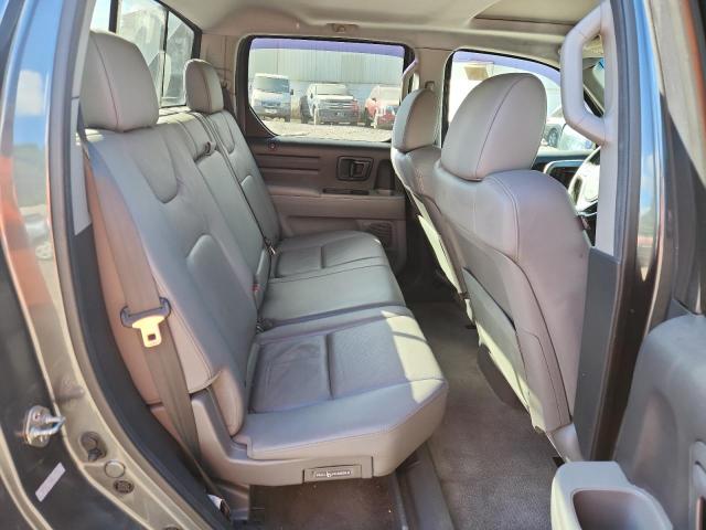 Photo 10 from auction – 2010 HONDA RIDGELINE with VIN 5FPYK1F50AB011015