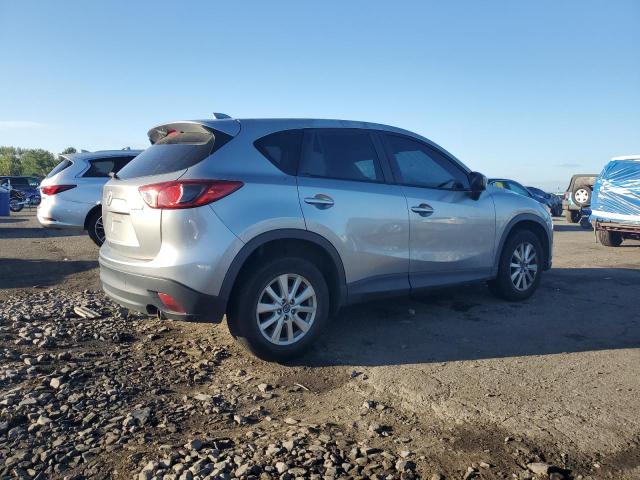 Photo 3 from auction – 2013 MAZDA CX-5 SPORT with VIN JM3KE2BE1D0135855
