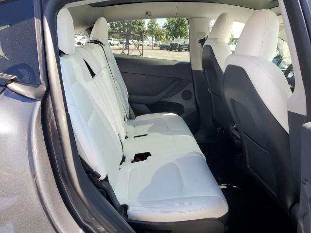 Photo 11 from auction – 2023 TESLA MODEL Y with VIN 7SAYGAEE0PF836687