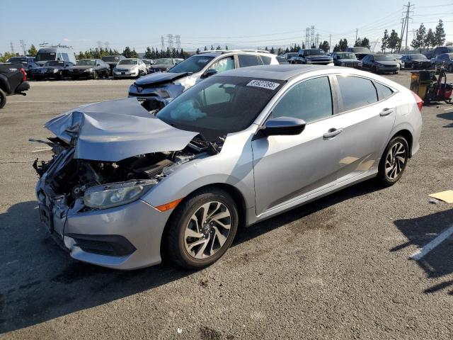 HONDA CIVIC EX 2017 with VIN 2HGFC2F74HH570271 - Photo from auction