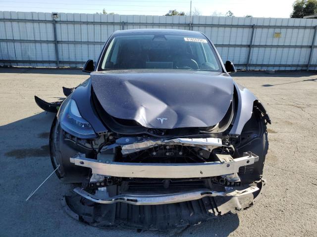 Photo 5 from auction – 2022 TESLA MODEL Y with VIN 7SAYGAEE2NF536338