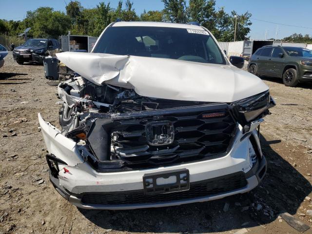 Photo 5 from auction – 2023 HONDA PILOT TRAI with VIN 5FNYG1H68PB048872