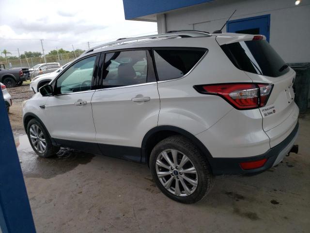 Photo 2 from auction – 2017 FORD ESCAPE TIT with VIN 1FMCU0J90HUD34673