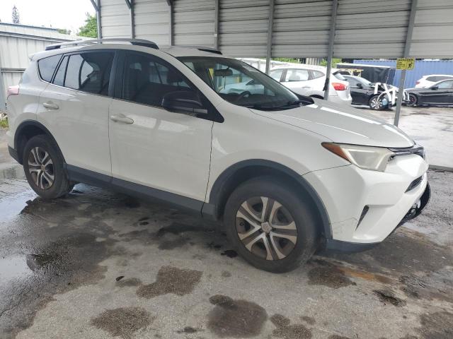 Photo 4 from auction – 2016 TOYOTA RAV4 LE with VIN JTMZFREV8GJ092235